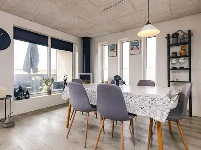 a dining room with a table and chairs at 6 person holiday home in Vestervig in Vestervig