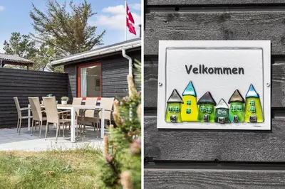 a sign on the side of a building with a table at 399-Thisted-Sotungevej-21 in Nørre Vorupør