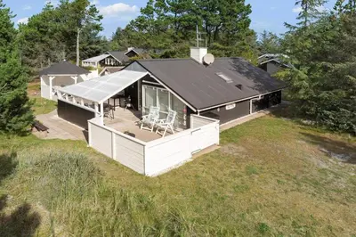 an overhead view of a large house with a deck at 225-Thisted-Revlingvej-6 in Thisted