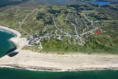 a small island with a red spot on a beach at 106-Thisted-Simonsvej-6 in Thisted