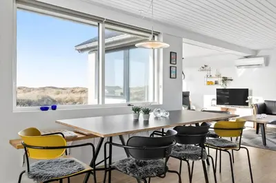 a dining room with a table and chairs at 106-Thisted-Simonsvej-6 in Thisted