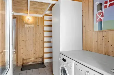 a laundry room with a washer and dryer at 1026-Thisted-Niels-Vognmands-Vej-26 in Torsted