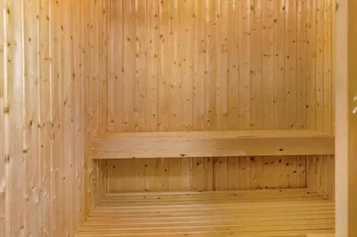 a wooden sauna with a wooden shelf in it at 780-Thisted-Molgaardsvej-60 in Thisted