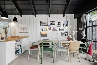 a dining room with a table and chairs at 1014-Thisted-Sletningen-7 in Torsted