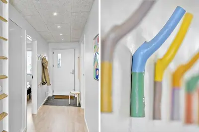 a hallway with colorful paintings on the wall at 794-Thisted-Havstokken-26-1 in Thisted