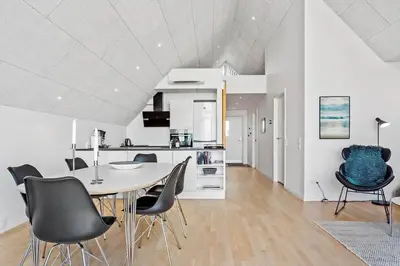 a kitchen and dining room with a table and chairs at 792-Thisted-Havstokken-22-1 in Thisted