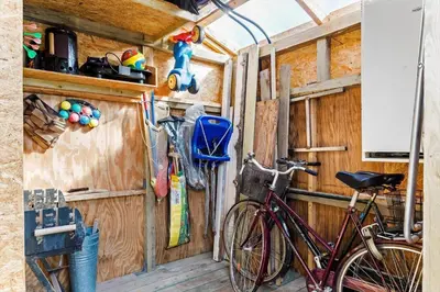 a bike parked next to a wooden wall at 310-Thisted-Store-Knuds-Vej-7 in Thisted