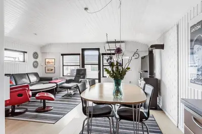 a living room with a table and chairs at 310-Thisted-Store-Knuds-Vej-7 in Thisted