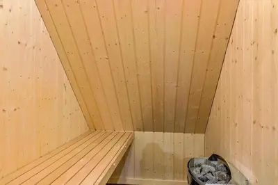 a small wooden sauna with a trash can in it at 1017-Thisted-Hvidbakken-17 in Torsted