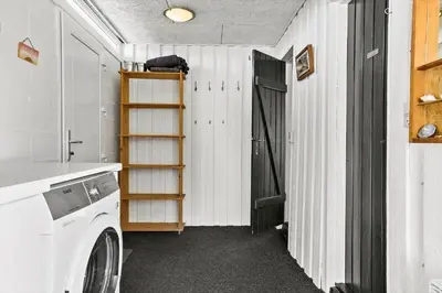 a laundry room with a washer and dryer at 518-Thisted-Klemsvej-18 in Thisted