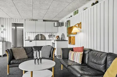 a living room with a couch and a table at 518-Thisted-Klemsvej-18 in Thisted