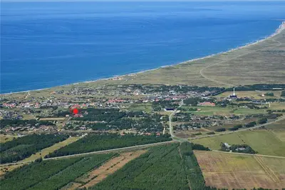 an aerial view of a town next to the ocean at 912-Thisted-Astien-17 in Torsted