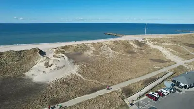 an aerial view of a parking lot next to the ocean at 193-Vestervig-Vesterhavsvej-36 in Vestervig