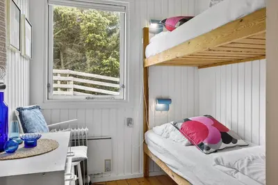 a small room with a bunk bed and a window at 131-Thisted-Aerenprisvej-13 in Thisted