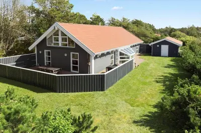 a small house with a large yard at 487-Thisted-Hummervej-9 in Thisted