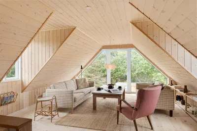 a living room with a couch and a table at 492-Thisted-Tunvej-7-B in Thisted