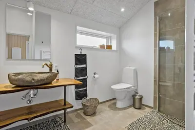 a bathroom with a sink and a toilet at 898-Thisted-Nordsovej-46-B in Thisted