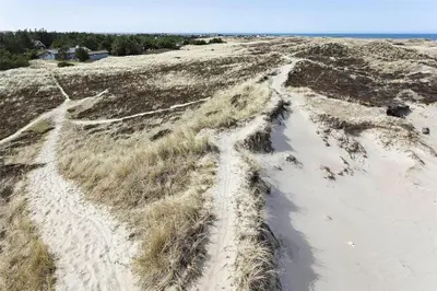 an aerial view of a beach with sand and grass at 337-Thisted-Hummervej-11 in Thisted