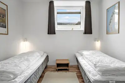 a room with two beds and a window at 303-Thisted-Hotelvej-5-F in Thisted