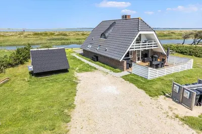 an aerial view of a home with a roof at 394-Vestervig-Magevej-43 in Vestervig
