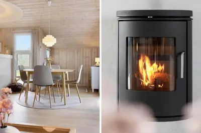 a living room with a fireplace and a table with chairs at 211-Vestervig-Rylevej-1 in Vestervig