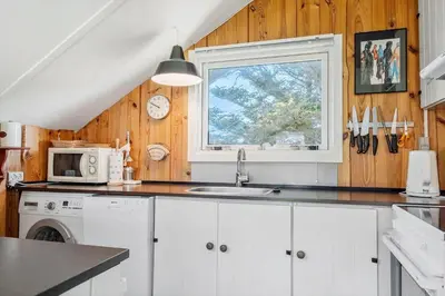 a kitchen with a sink and a window at 340-Thisted-Delfinvej-25 in Thisted