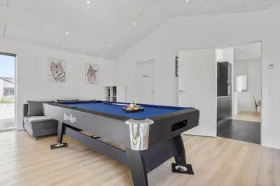 a living room with a pool table in it at 105-Thisted-Gronkaervej-19-B in Thisted