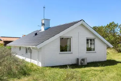 a white house sitting on top of a hill at 314-Thisted-Mose-Bollevej-14 in Thisted