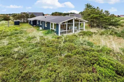 a house with a solar roof on a field at 767-Thisted-Nordsovej-63 in Thisted