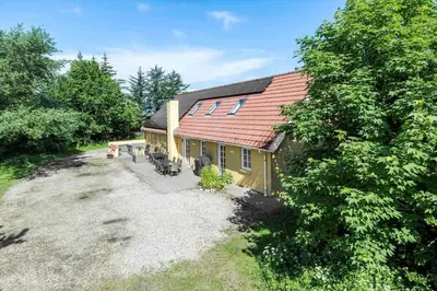 an overhead view of a house with a patio at 100-Thisted-Kapelvej-1 in Thisted