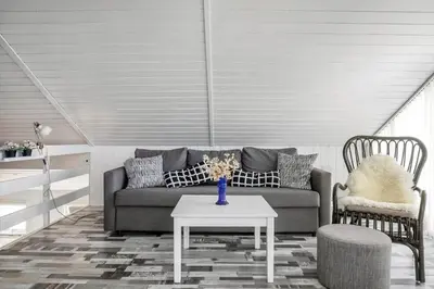 a living room with a couch and a table at 663-Thisted-Nordsovej-166 in Thisted