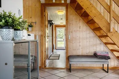 a hallway of a house with a wooden wall at 663-Thisted-Nordsovej-166 in Thisted