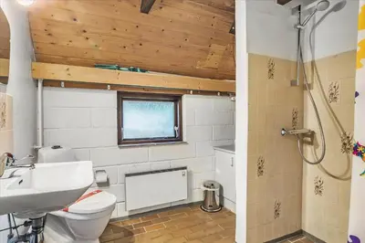 a bathroom with a toilet and a sink at 875-Thisted-Flyndervej-23 in Thisted
