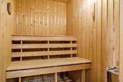 a wooden sauna with a wooden bench in it at 191-Thisted-Bredkaervej-61 in Thisted