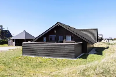 a small house sitting on top of a hill at 896-Thisted-Fiskervej-81 in Thisted