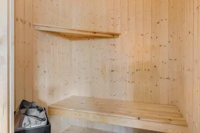 a wooden sauna with a wooden bench in it at 170-Thisted-Sotungevej-2 in Thisted