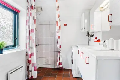 a bathroom with a sink and a shower at 400-Thisted-Nordsovej-186 in Thisted