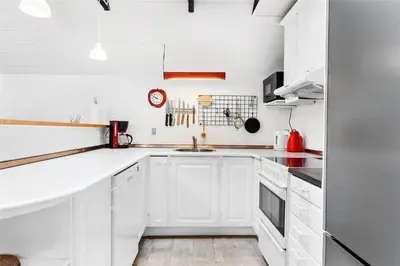 a white kitchen with white cabinets and a sink at 400-Thisted-Nordsovej-186 in Thisted