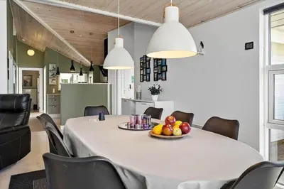 a dining room with a table with fruit on it at 878-Thisted-Smedevej-15 in Thisted