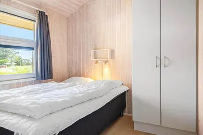 a bedroom with a bed and a window at 233-Thisted-Tunvej-5 in Thisted