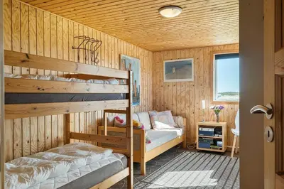 a bedroom with two bunk beds in a house at 306-Vestervig-Klitvej-6 in Vestervig