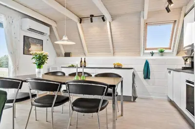 a kitchen and dining room with a table and chairs at 169-Thisted-Fiskervej-69 in Thisted