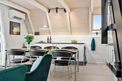 a kitchen and dining room with a table and chairs at 169-Thisted-Fiskervej-69 in Thisted