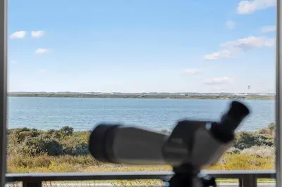 a microphone in front of a view of a lake at 600-Vestervig-Krik-Strandvej-100 in Vestervig
