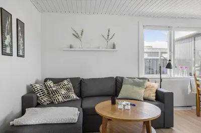 a living room with a couch and a table at 790-Thisted-Nordsovej-90 in Thisted