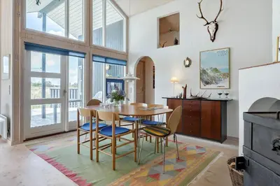 a dining room with a table and chairs at 546-Thisted-Kuttervej-16 in Thisted