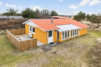 a small yellow house with an orange roof at 251-Thisted-Fiskervej-51 in Thisted