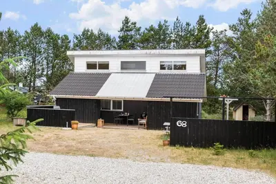 a house with a black and white roof at 669-Thisted-Kristinesvej-68 in Thisted
