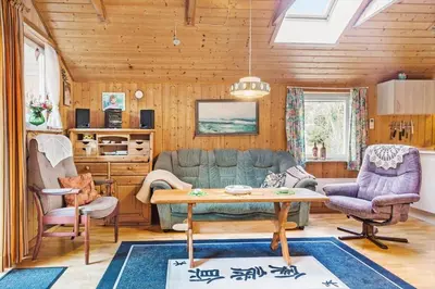 a living room with a couch and two chairs and a table at 749-Thisted-Nordsovej-214 in Thisted