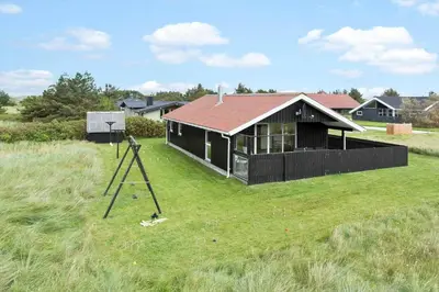 a house with a telescope in front of it at 855-Thisted-Flyndervej-5 in Thisted